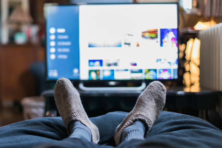 Wearing slippers while watching connected TV during the pandemic. 